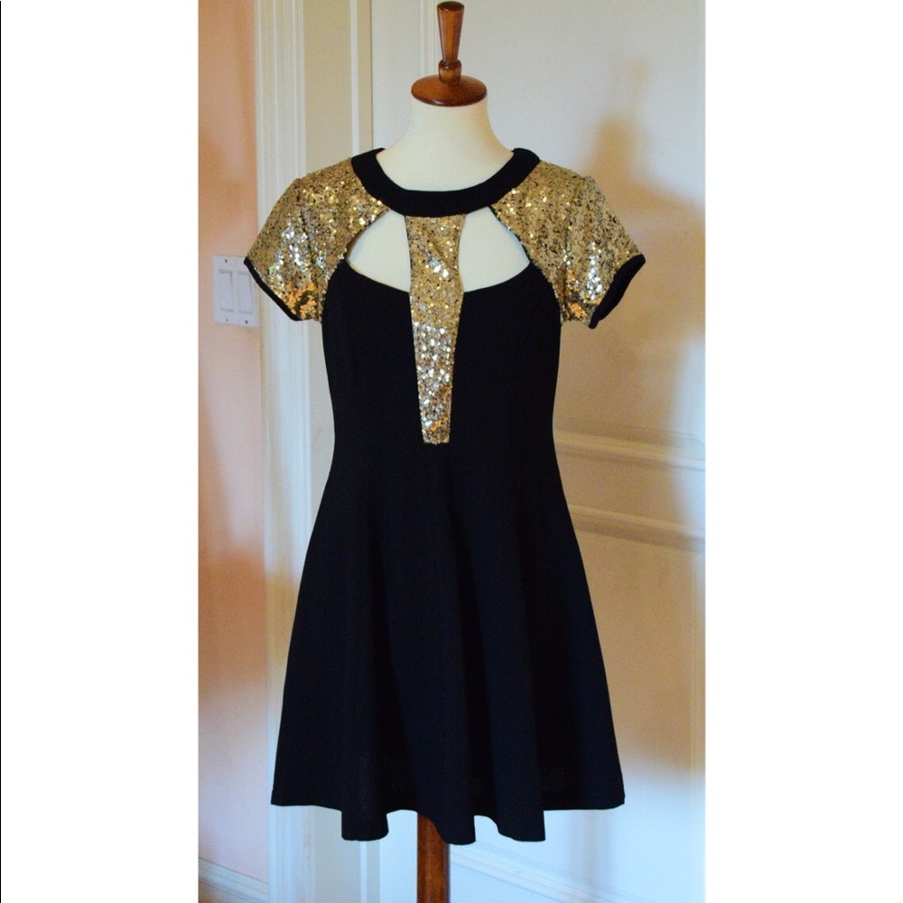 Black and gold sequin dress